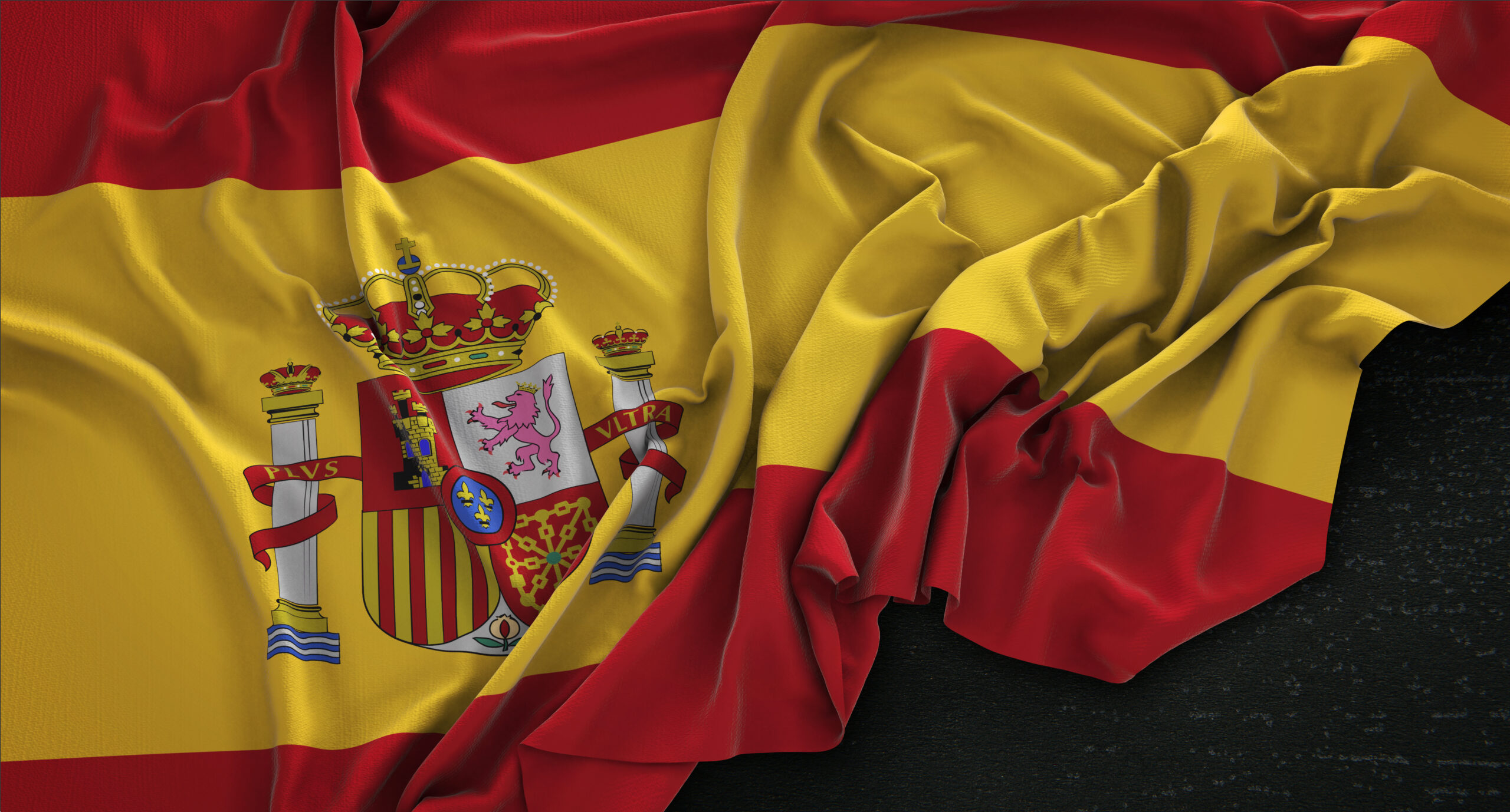 https://ubctourism.com/wp-content/uploads/2024/09/spain-flag-wrinkled-dark-background-3d-render-scaled.jpg